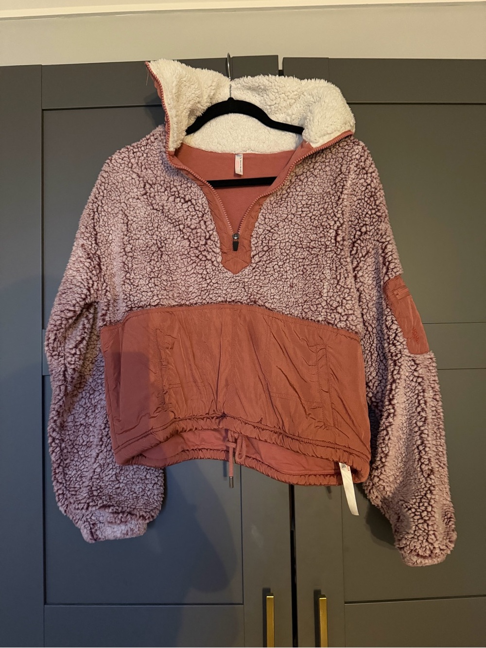 FP Movement by Free People rust tank top with black trim